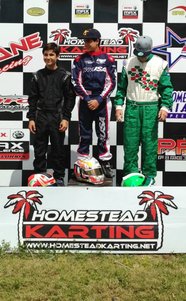 Three drivers on the podium at Homestead Karting in Homestead, Florida